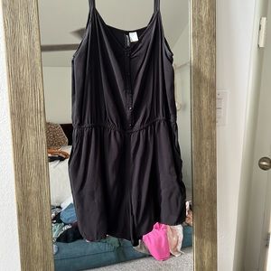 Black romper (shorts) with pockets and button details (front)